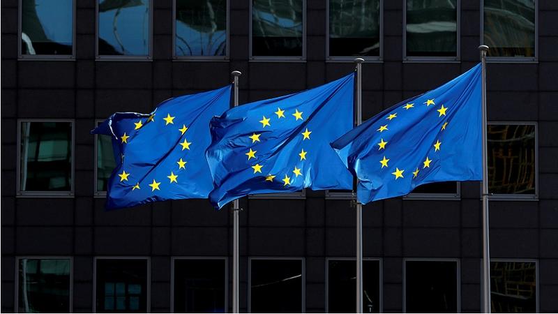 FILE PHOTO: European Union flags flutter outside the European Commission headquarters in Brussels, Belgium August 21, 2020. REUTERS/Yves Herman/File Photo