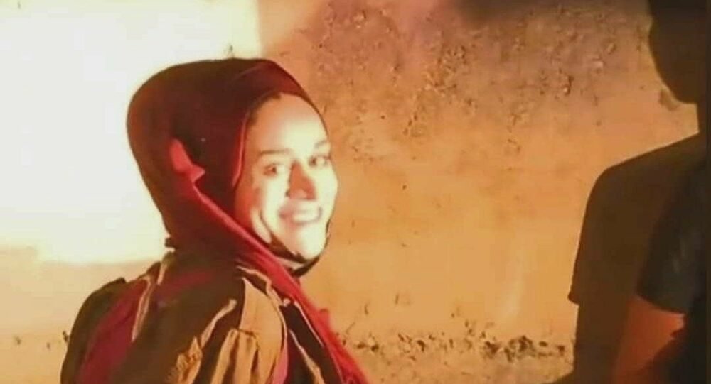 ابتسامة مريم المقدسية لحظة تكبيلها بالأصفاد الصهيونية