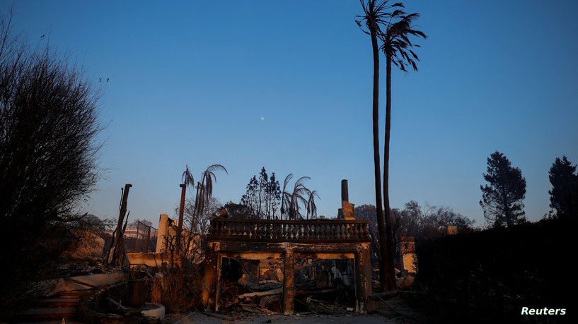 The remains of a house burned down by the Palisades Fire stands in the Pacific Palisades neighborhood, in Los Angeles, California, U.S. January 9, 2025. REUTERS/Mike Blake